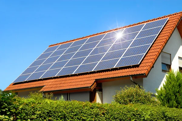 depositphotos_5111838-stock-photo-solar-panel-on-a-red
