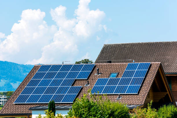 Solar Panel Photovoltaic installation on a Roof, alternative electricity source in Weggis, Switzerland.